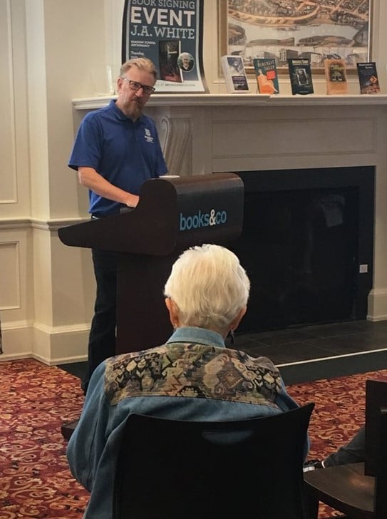 Photo of David Braughler, President and CEO of Braughler Books, presenting at the Antioch Writers Workshop