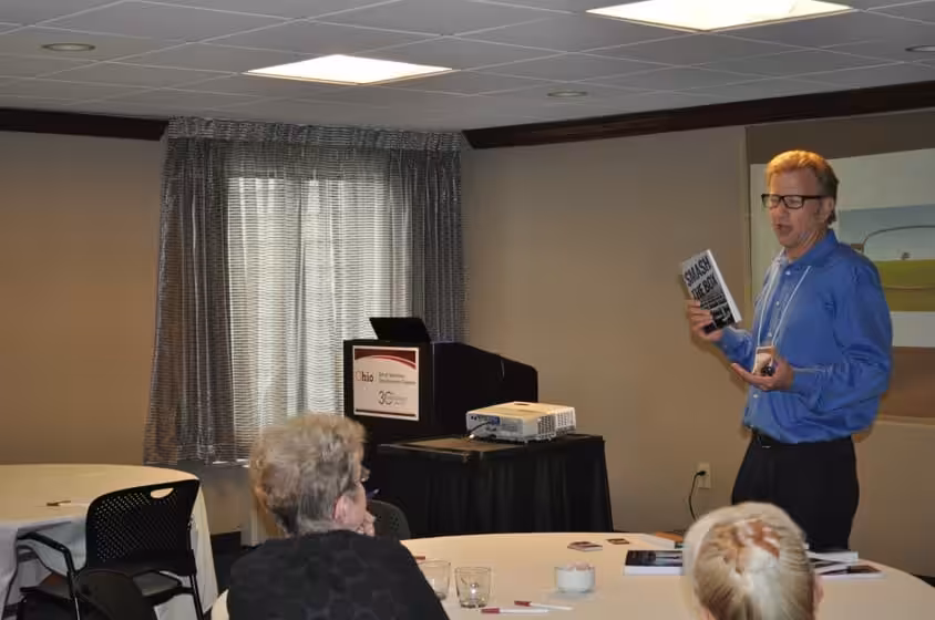 David Braughler, President and CEO of Braughler Books, presents at a publishing industry event